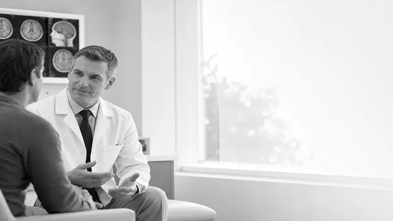 Neurologist consulting with a patient at Summit Neurology